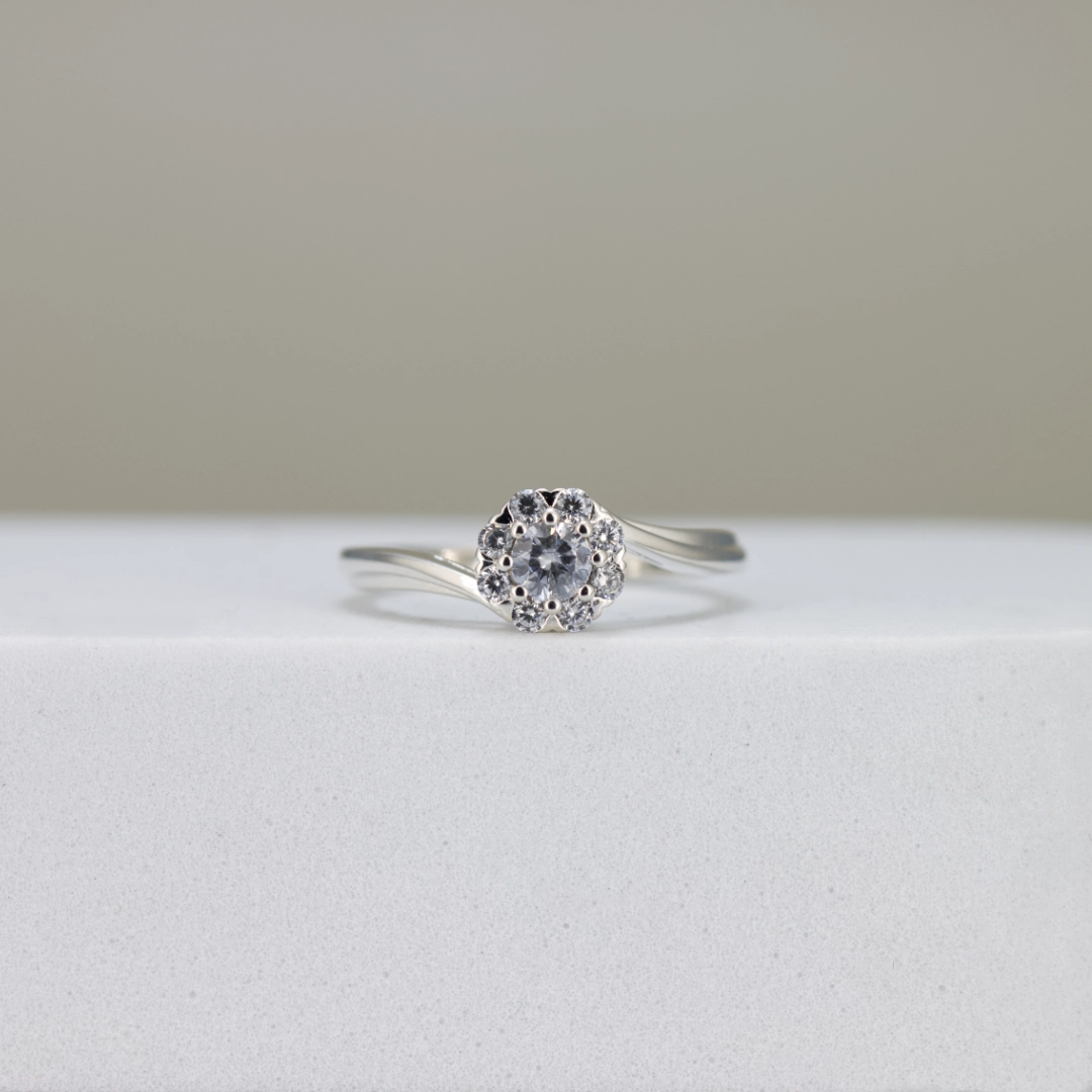 Round-Cut Halo Swirl Engagement Ring